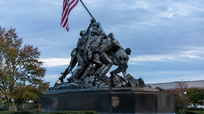 wp-3a6aff1c-2549-426b-9742-a309eebe226d AI-generated illustration: Ex-DACA Recipient Charged in Sledgehammer Attack on Iwo Jima Statue